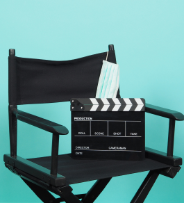 Clapperboard on black chair